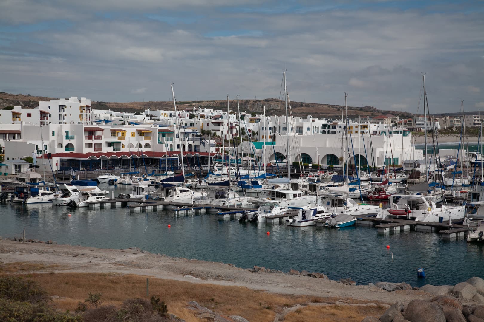 Langebaan marina with yachts and white-washed buildings
