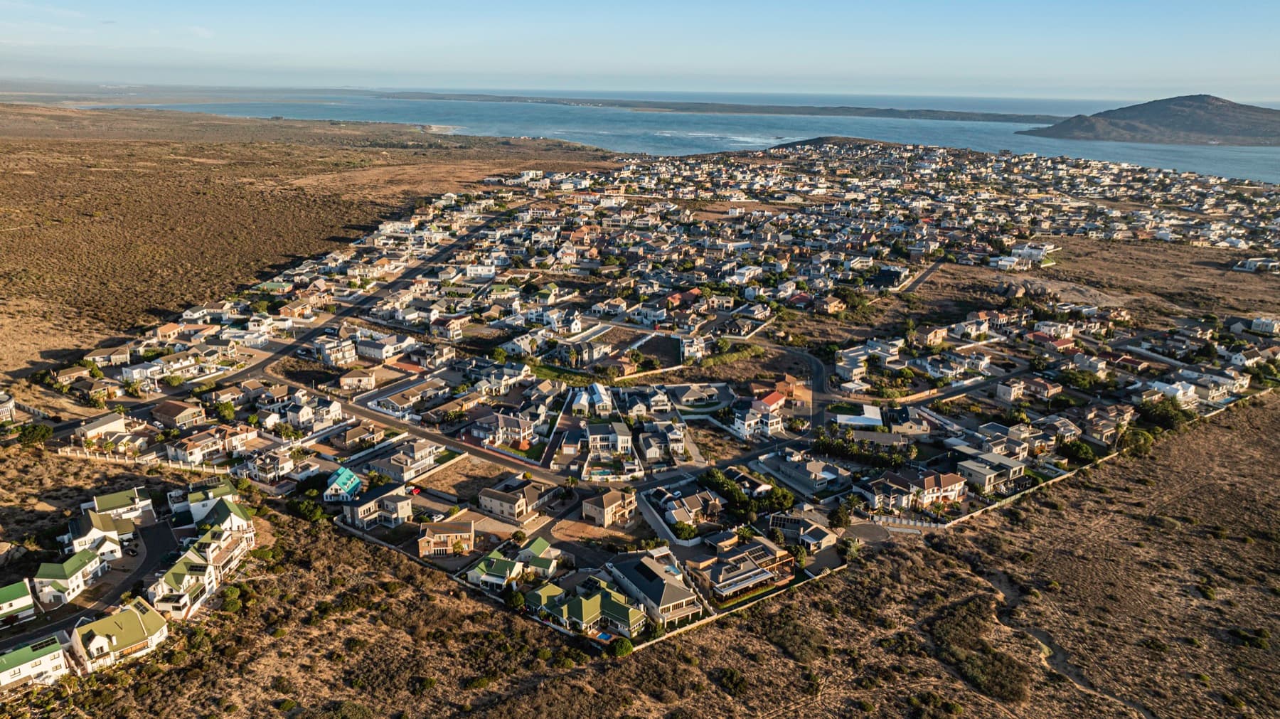 Wide aerial view of Langebaan town stretching to the lagoon